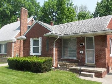 hoarder house buyer in Detroit